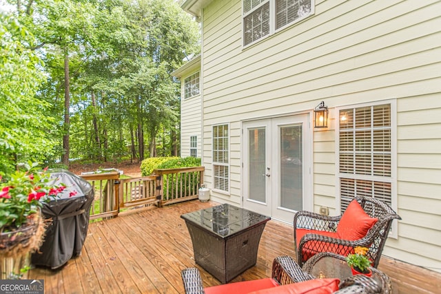 5767 Wembley Dr, Douglasville, GA 30135 - wooden terrace featuring french doors and a grill