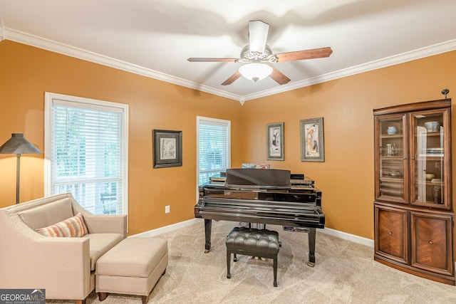 5767 Wembley Dr, Douglasville, GA 30135 - sitting room featuring crown molding, a ceiling fan, and carpet
