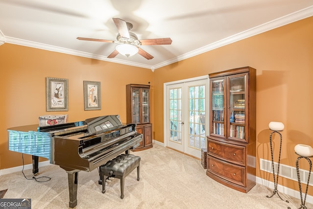 5767 Wembley Dr, Douglasville, GA 30135 - sitting room featuring ornamental molding, a ceiling fan, carpet flooring, and french doors