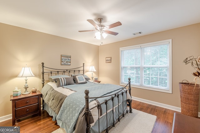 5767 Wembley Dr, Douglasville, GA 30135 - bedroom featuring wood finished floors and ceiling fan