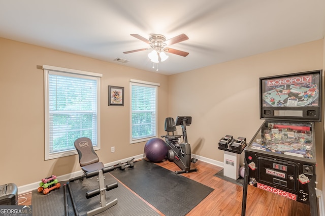 5767 Wembley Dr, Douglasville, GA 30135 - exercise area with a ceiling fan and wood finished floors