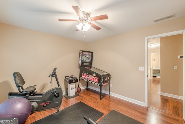5767 Wembley Dr, Douglasville, GA 30135 - exercise room featuring a ceiling fan and wood-type flooring
