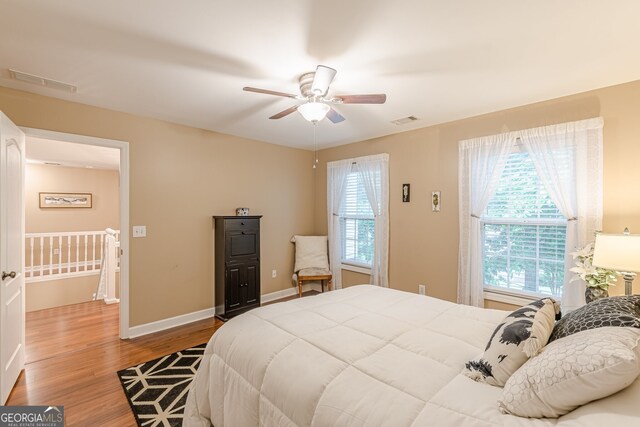 5767 Wembley Dr, Douglasville, GA 30135 - bedroom with wood finished floors and ceiling fan