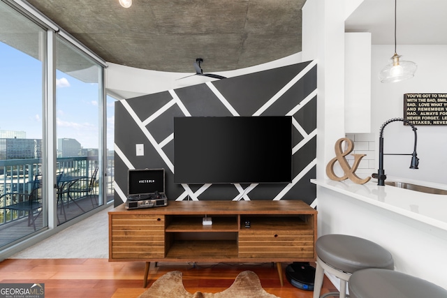 3324 Peachtree Rd NE Unit 1813, Atlanta, GA 30305 - living room featuring wood finished floors and expansive windows