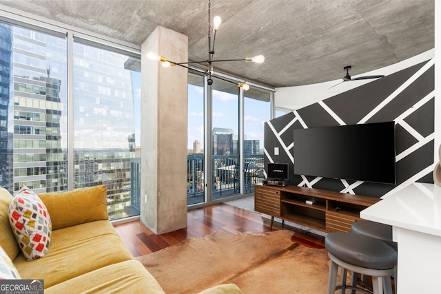 3324 Peachtree Rd NE Unit 1813, Atlanta, GA 30305 - living room featuring a wall of windows, wood finished floors, a chandelier, and ceiling fan