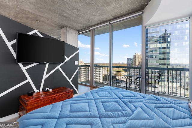 3324 Peachtree Rd NE Unit 1813, Atlanta, GA 30305 - bedroom featuring access to exterior, a view of city, and floor to ceiling windows
