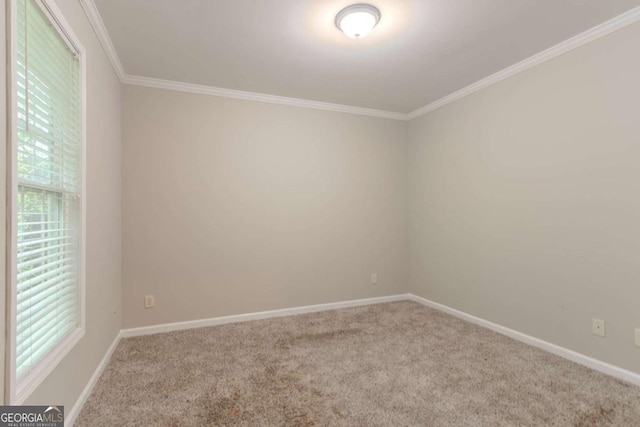 2378 Randall Ave, Lithonia, GA 30058 - spare room with healthy amount of natural light, carpet, crown molding, and baseboards