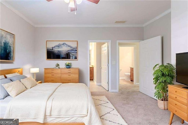 2378 Randall Ave, Lithonia, GA 30058 - bedroom featuring crown molding, light carpet, ensuite bathroom, baseboards, and ceiling fan