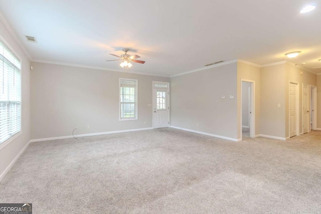 2378 Randall Ave, Lithonia, GA 30058 - unfurnished room with light carpet, baseboards, a ceiling fan, and ornamental molding