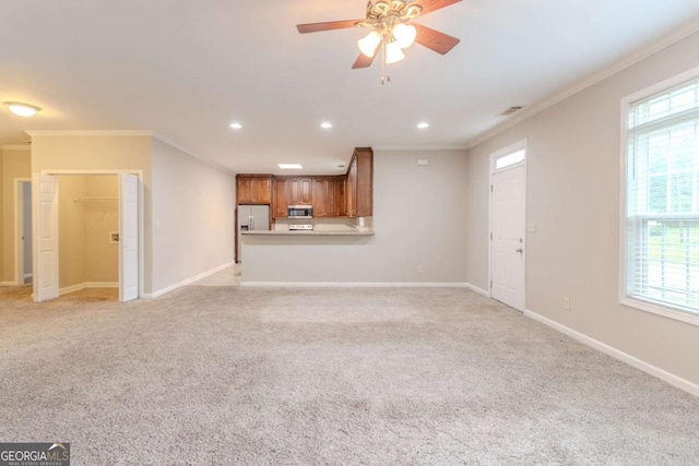 2378 Randall Ave, Lithonia, GA 30058 - unfurnished living room with ornamental molding, baseboards, light carpet, recessed lighting, and ceiling fan