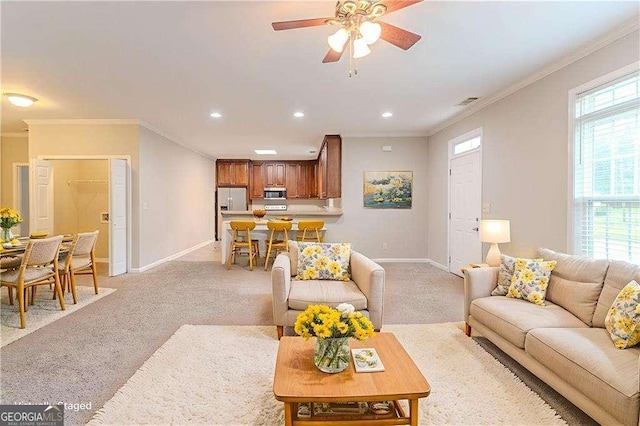 2378 Randall Ave, Lithonia, GA 30058 - living area featuring light carpet, ornamental molding, baseboards, recessed lighting, and a ceiling fan