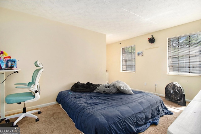 6433 Stone Ter, Morrow, GA 30260 - carpeted bedroom with baseboards and a textured ceiling