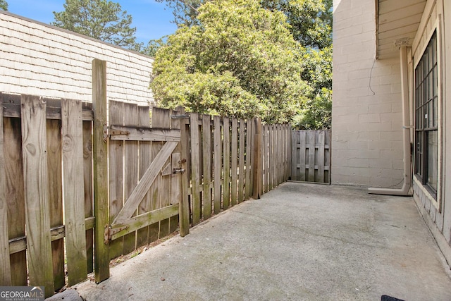 6433 Stone Ter, Morrow, GA 30260 - view of patio featuring a gate