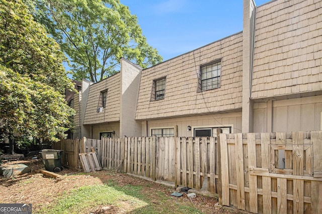 6433 Stone Ter, Morrow, GA 30260 - view of side of home featuring mansard roof