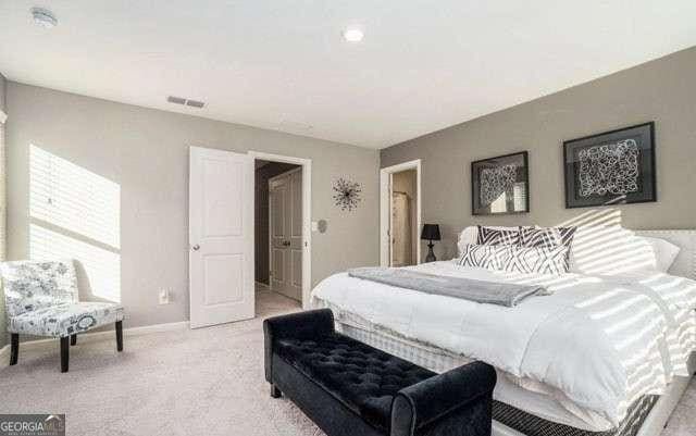 268 Rydal Way, Winder, GA 30680 - bedroom with light carpet and baseboards
