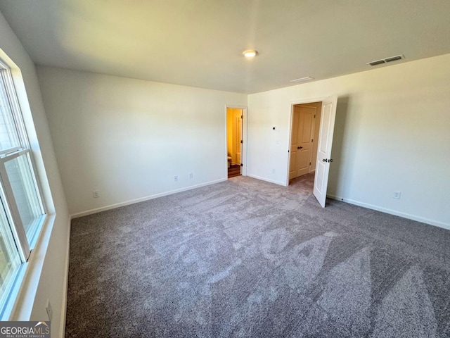 268 Rydal Way, Winder, GA 30680 - carpeted empty room featuring plenty of natural light