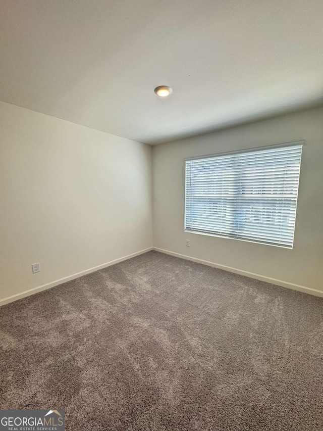 268 Rydal Way, Winder, GA 30680 - carpeted spare room featuring baseboards
