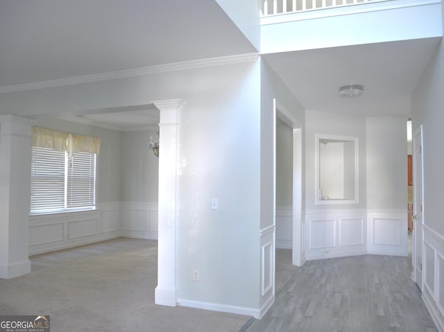3700 Newhalem St SW, Atlanta, GA 30331 - hallway with a decorative wall, wainscoting, ornamental molding, and wood finished floors