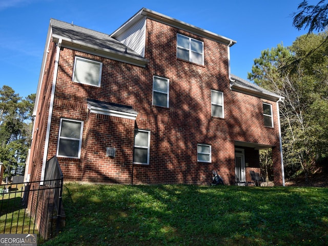 3700 Newhalem St SW, Atlanta, GA 30331 - back of property featuring brick siding and roof with shingles