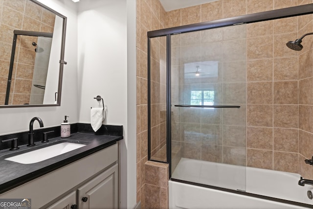 50 Frederica Oaks Ln, Saint Simons, GA 31522 - bathroom with shower / bath combination with glass door and vanity