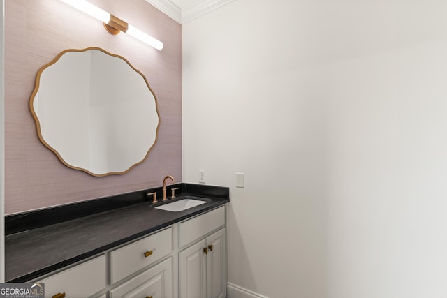 50 Frederica Oaks Ln, Saint Simons, GA 31522 - bathroom featuring crown molding, vanity, and baseboards