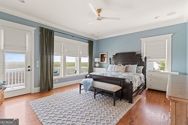 50 Frederica Oaks Ln, Saint Simons, GA 31522 - bedroom featuring access to outside, ornamental molding, hardwood / wood-style flooring, and a ceiling fan