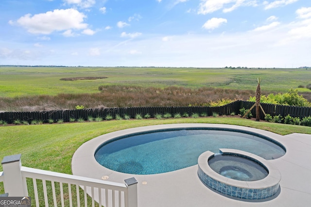 50 Frederica Oaks Ln, Saint Simons, GA 31522 - view of pool featuring a pool with connected hot tub and a rural view
