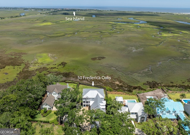50 Frederica Oaks Ln, Saint Simons, GA 31522 - aerial perspective of suburban area with a large body of water
