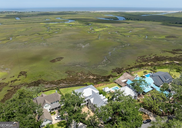 50 Frederica Oaks Ln, Saint Simons, GA 31522 - aerial perspective of suburban area featuring a nearby body of water