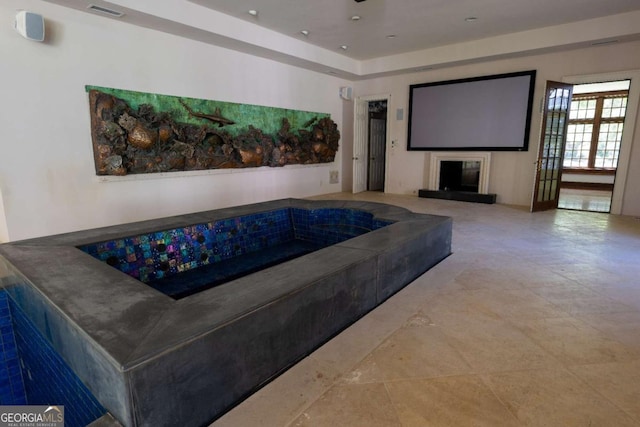 4790 Shallowford Rd, Roswell, GA 30075 - cinema room featuring a fireplace with raised hearth