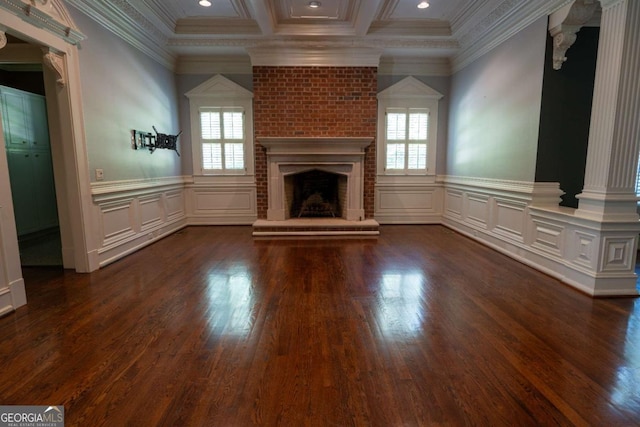 4790 Shallowford Rd, Roswell, GA 30075 - unfurnished living room with plenty of natural light, decorative columns, dark wood-style flooring, a fireplace, and a decorative wall