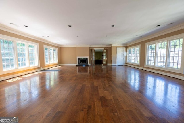 4790 Shallowford Rd, Roswell, GA 30075 - unfurnished living room featuring wood finished floors, crown molding, and baseboards