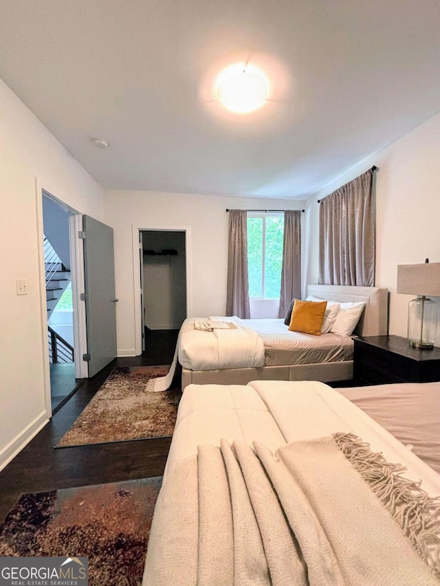 1463 Macklone St NE, Atlanta, GA 30307 - bedroom featuring dark wood finished floors and baseboards
