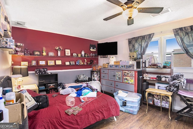 119 Pearl St, Rockmart, GA 30153 - bedroom with wood finished floors and a textured ceiling