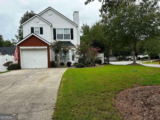3251 Avensong Village Cir, Milton, GA 30004 - traditional home featuring a chimney, a garage, driveway, and brick siding
