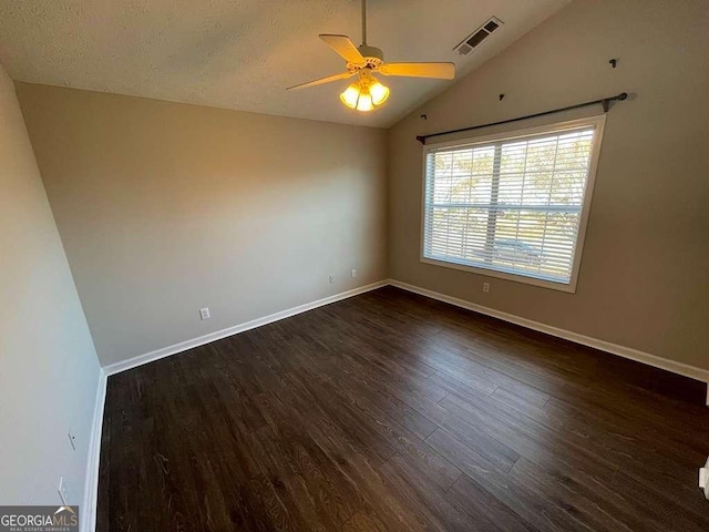 3251 Avensong Village Cir, Milton, GA 30004 - empty room with vaulted ceiling, a ceiling fan, and dark wood-style flooring