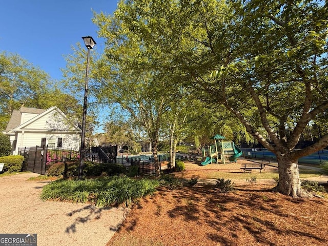 3251 Avensong Village Cir, Milton, GA 30004 - view of yard featuring a playground