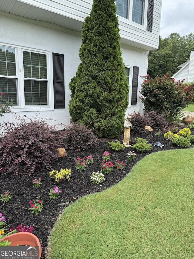 60 Buck Trl, Newnan, GA 30265 - property entrance with stucco siding and a lawn