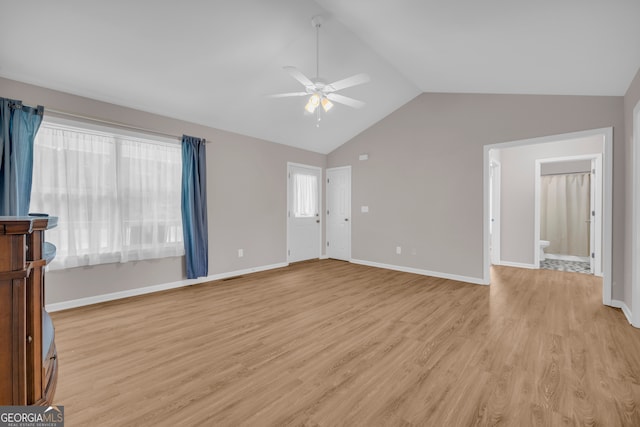 1861 Skyline Dr, Toccoa, GA 30577 - unfurnished room featuring lofted ceiling, ceiling fan, light wood finished floors, and baseboards