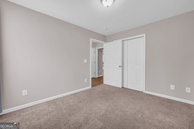 1861 Skyline Dr, Toccoa, GA 30577 - unfurnished bedroom featuring carpet flooring, baseboards, and a closet