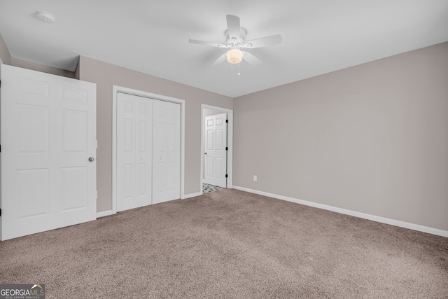 1861 Skyline Dr, Toccoa, GA 30577 - unfurnished bedroom with carpet, baseboards, a closet, and ceiling fan
