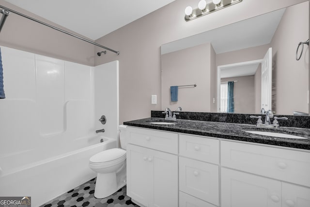 1861 Skyline Dr, Toccoa, GA 30577 - bathroom featuring double vanity, toilet, and  shower combination