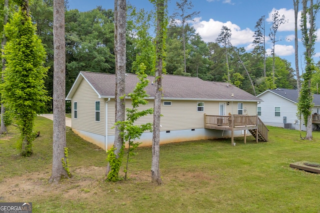 1861 Skyline Dr, Toccoa, GA 30577 - back of house featuring crawl space, a wooden deck, a lawn, stairway, and central AC unit