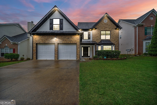 773 Minor Oaks Run NW, Lilburn, GA 30047 - traditional-style home with a standing seam roof, a front yard, driveway, an attached garage, and a chimney