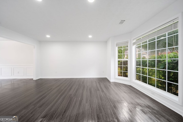 773 Minor Oaks Run NW, Lilburn, GA 30047 - spare room featuring dark wood finished floors and recessed lighting