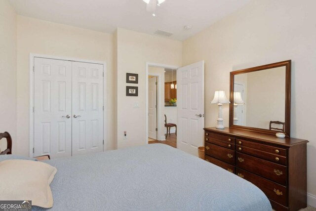 2565 Grapevine Cir Unit 103, Cumming, GA 30041 - bedroom with a closet and ceiling fan