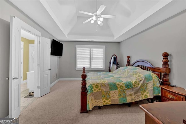 60 Independence Ave, Dallas, GA 30132 - bedroom with a raised ceiling, baseboards, carpet, and a ceiling fan