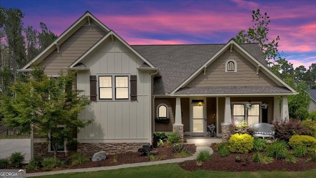 60 Independence Ave, Dallas, GA 30132 - craftsman-style house with a porch, a shingled roof, board and batten siding, and stone siding