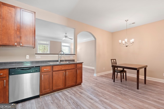 111 Moonlight Trl, Port Wentworth, GA 31407 - kitchen featuring stainless steel dishwasher, a sink, brown cabinets, light wood-type flooring, and dark countertops