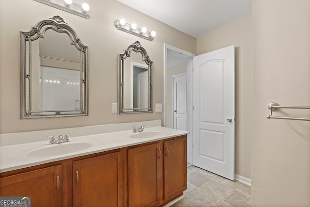 111 Moonlight Trl, Port Wentworth, GA 31407 - bathroom with double vanity, baseboards, and tile patterned floors